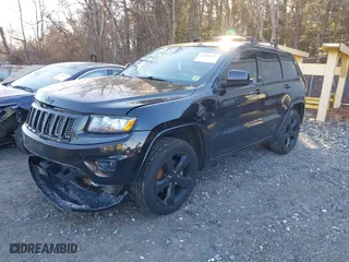 2015 Jeep Grand Cherokee Altitude with VIN 1C4RJFAG6FC796571, listed as a IAAI auction lot 41258471 with 104,049 mi miles. Bid and sale history available at carsss.com. Image 17.