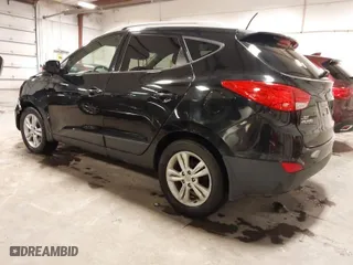 2013 Hyundai Tucson GLS with VIN KM8JU3AC0DU754948, listed as a IAAI auction lot 41811891 with 139,056 mi miles. Bid and sale history available at carsss.com. Image 3.