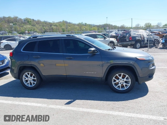 2014 Jeep Cherokee Latitude with VIN 1C4PJMCS2EW137767, listed as a IAAI auction lot 42052071 with 165,300 mi miles and . Bid and sale history available at DreamBid. Image 13.