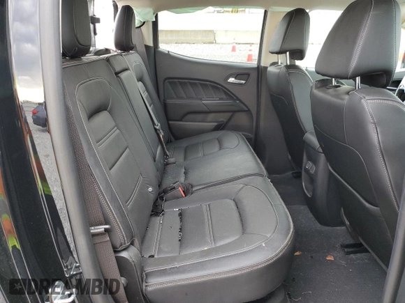 2021 GMC Canyon 4WD Denali z VIN 1GTG6EEN3M1101872, wystawiony jako Copart lot #53963085 z przebiegiem 72 791 mil mil oraz Szkoda całkowita • Salvage title. Historia ofert i sprzedaży dostępna na DreamBid. Obrazek 10.