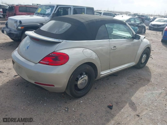 2013 Volkswagen Beetle Convertible 2.5L with VIN 3VW5X7AT0DM815494, listed as a IAAI auction lot 41755570 with 132,570 mi miles. Bid and sale history available at carsss.com. Image 4.