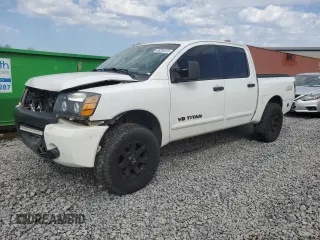 2005 Nissan Titan SE with VIN 1N6BA07B25N535867, listed as a Copart auction lot 45205415 with 207,858 mi miles and Salvage Title. Bid and sale history available at carsss.com. Image 1.