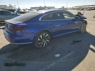 2021 Volkswagen Arteon SEL R-Line с VIN WVWHR7AN0ME012914, выставлен на аукционе Copart как лот 43871805 с пробегом 59 657 миль миль и Списание • Salvage title. История ставок и продаж доступна на DreamBid. Изображение 3.