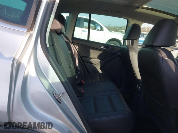 2013 Volkswagen Tiguan S with VIN WVGAV3AX0DW572915, listed as a IAAI auction lot 41937763 with 65,136 mi miles and . Bid and sale history available at DreamBid. Image 8.