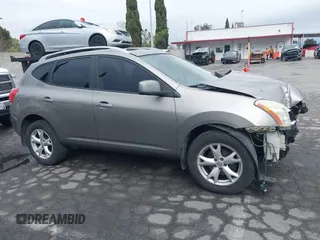 2009 Nissan Rogue SL with VIN JN8AS58T89W061346, listed as a IAAI auction lot 41772866 with 184,571 mi miles and . Bid and sale history available at DreamBid. Image 13.