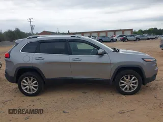 2015 Jeep Cherokee Limited with VIN 1C4PJMDS3FW706058, listed as a IAAI auction lot 41951302 with 163,404 mi miles. Bid and sale history available at carsss.com. Image 13.