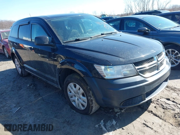 2013 Dodge Journey SE with VIN 3C4PDCAB7DT731506, listed as a IAAI auction lot 41762394 with 215,424 mi miles. Bid and sale history available at carsss.com. Image 1.