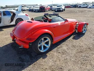1999 Plymouth Prowler z VIN 1P3EW65G4XV503282, wystawiony jako IAAI lot #41282258 z przebiegiem 58 866 mil mil oraz . Historia ofert i sprzedaży dostępna na DreamBid. Obrazek 4.