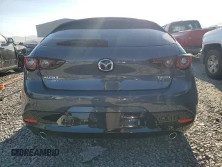 2024 Mazda 3 S Carbon Edition with VIN JM1BPBLM4R1714705, listed as a Copart auction lot 69140474 with 1,808 mi miles and Salvage Title. Bid and sale history available at DreamBid. Image 6.
