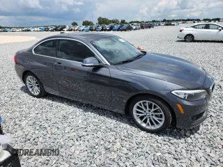 2015 BMW 2 Series 228i xDrive with VIN WBA1F7C5XFV367659, listed as a Copart auction lot 58855145 with 50,848 mi miles and Salvage title. Bid and sale history available at DreamBid. Image 4.