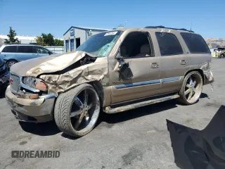 2000 GMC Yukon SLT with VIN 1GKEK13T2YJ131985, listed as a Copart auction lot 68952584 with 210,186 mi miles and Salvage Title. Bid and sale history available at carsss.com. Image 1.