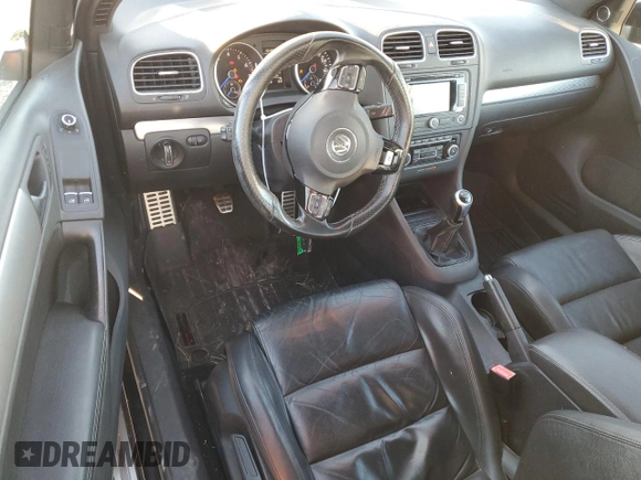 2012 Volkswagen Golf w/Sunroof & Navi z VIN WVWRF7AJ5CW282434, wystawiony jako Copart lot #79504164 z przebiegiem 115 759 mil mil oraz Szkoda całkowita • Salvage title. Historia ofert i sprzedaży dostępna na DreamBid. Obrazek 8.