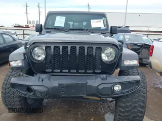 2023 Jeep Gladiator Sport S z VIN 1C6HJTAG9PL554845, wystawiony jako IAAI lot #41312360 z przebiegiem 18 077 mil mil oraz . Historia ofert i sprzedaży dostępna na DreamBid. Obrazek 13.