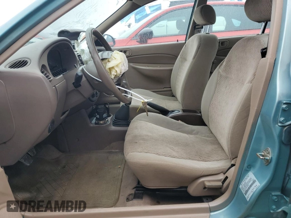 1999 Ford Escort LX with VIN 1FAFP10P6XW196483, listed as a Copart auction lot 59215635 with 74,859 mi miles and Salvage title. Bid and sale history available at DreamBid. Image 7.