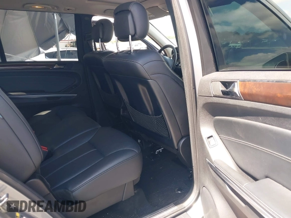 2012 Mercedes-Benz GL 450 z VIN 4JGBF7BE1CA800793, wystawiony jako IAAI lot #42312472 z przebiegiem 155 847 mil mil oraz . Historia ofert i sprzedaży dostępna na DreamBid. Obrazek 8.