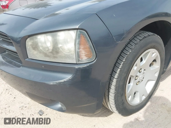 2007 Dodge Charger z VIN 2B3KA43R37H786374, wystawiony jako IAAI lot #42213471 z przebiegiem Nie podano mil oraz . Historia ofert i sprzedaży dostępna na DreamBid. Obrazek 14.