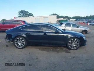 2014 Audi A7 Premium Plus z VIN WAUWGAFC4EN092525, wystawiony jako IAAI lot #42331183 z przebiegiem 183 258 mil mil oraz . Historia ofert i sprzedaży dostępna na DreamBid. Obrazek 13.