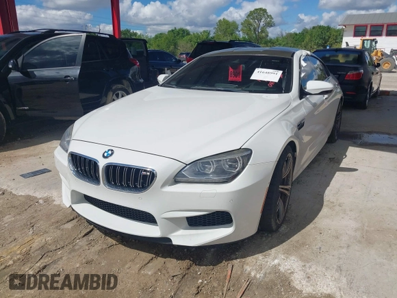 2014 BMW M6 z VIN WBS6C9C50EDV73809, wystawiony jako IAAI lot #41648991 z przebiegiem 68 054 mil mil oraz . Historia ofert i sprzedaży dostępna na DreamBid. Obrazek 2.
