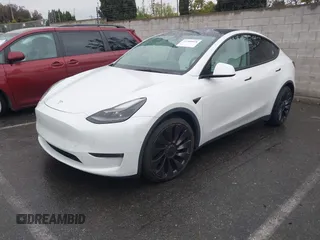 2021 Tesla Model Y Performance with VIN 5YJYGDEF2MF230374, listed as a IAAI auction lot 41708828 with 20,272 mi miles. Bid and sale history available at carsss.com. Image 2.