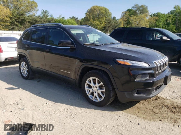 2014 Jeep Cherokee Latitude with VIN 1C4PJLCB0EW148910, listed as a Copart auction lot 54118555 with 154,245 mi miles and Salvage Title. Bid and sale history available at DreamBid. Image 4.