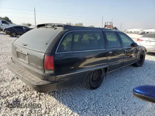 1996 Chevrolet Caprice with VIN 1G1BL82P2TR106404, listed as a Copart auction lot 74213214 with 156,588 mi miles and Salvage title. Bid and sale history available at DreamBid. Image 3.