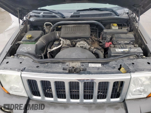2006 Jeep Commander z VIN 1J8HH48NX6C106832, wystawiony jako Copart lot #60544515 z przebiegiem 170 404 mil mil oraz Czysty tytuł • Clean title. Historia ofert i sprzedaży dostępna na DreamBid. Obrazek 11.