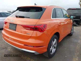 2021 Audi Q3 Premium with VIN WA1AUCF30M1137042, listed as a IAAI auction lot 41502456 with 61,742 mi miles and . Bid and sale history available at DreamBid. Image 4.