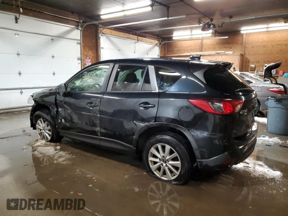2015 Mazda CX-5 Touring with VIN JM3KE4CY1F0458911, listed as a Copart auction lot 87666255 with 0 mi miles and Salvage Title. Bid and sale history available at carsss.com. Image 2.