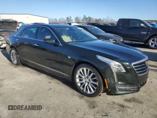 2016 Cadillac CT6 AWD with VIN 1G6KB5RS5GU167206, listed as a Copart auction lot 86064454 with 125,947 mi miles and Salvage title. Bid and sale history available at DreamBid. Image 4.