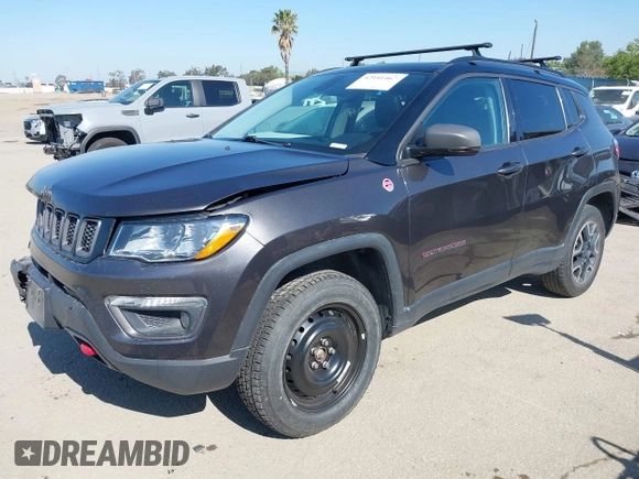 2019 Jeep Compass Trailhawk with VIN 3C4NJDDB3KT759849, listed as a IAAI auction lot 42141467 with 100,915 mi miles and . Bid and sale history available at DreamBid. Image 17.
