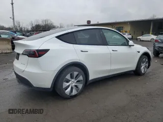 2023 Tesla Model Y Long Range with VIN 7SAYGDEEXPA122953, listed as a Copart auction lot 52627095 with Not Provided miles and Salvage Title. Bid and sale history available at DreamBid. Image 3.