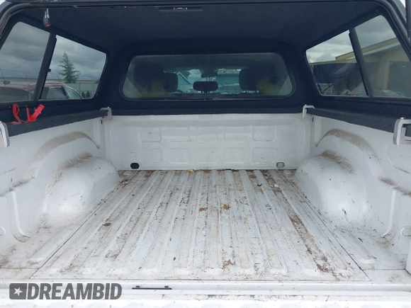 2014 Ram 1500 Tradesman with VIN 1C6RR7KG4ES323888, listed as a IAAI auction lot 41975474 with 93,779 mi miles and . Bid and sale history available at DreamBid. Image 18.