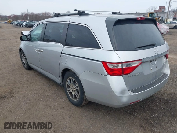 2013 Honda Odyssey EX-L with VIN 5FNRL5H65DB050789, listed as a IAAI auction lot 41911537 with 160,348 mi miles and . Bid and sale history available at carsss.com. Image 3.