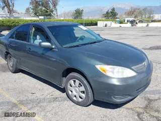 2004 Toyota Camry LE with VIN 4T1BE32K84U371881, listed as a IAAI auction lot 41861322 with 257,149 mi miles. Bid and sale history available at carsss.com. Image 1.