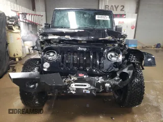 2015 Jeep Wrangler Unlimited Rubicon Hard Rock with VIN 1C4HJWFG4FL676868, listed as a Copart auction lot 48489525 with 100,771 mi miles and Salvage title. Bid and sale history available at DreamBid. Image 5.