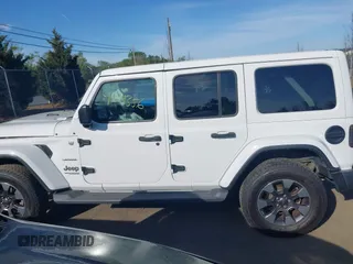 2018 Jeep Wrangler Unlimited Sahara z VIN 1C4HJXEG9JW227829, wystawiony jako IAAI lot #42099356 z przebiegiem 130 259 mil mil oraz . Historia ofert i sprzedaży dostępna na DreamBid. Obrazek 14.