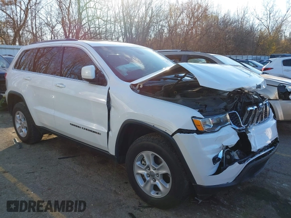 2017 Jeep Grand Cherokee Laredo with VIN 1C4RJFAGXHC756562, listed as a IAAI auction lot 40793476 with 102,241 mi miles and . Bid and sale history available at DreamBid. Image 1.