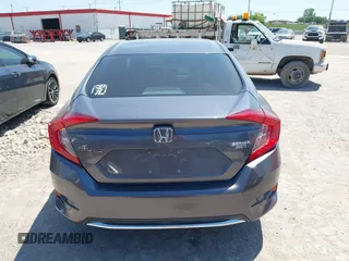 2019 Honda Civic Sedan LX with VIN 19XFC2F63KE025722, listed as a IAAI auction lot 42045594 with 57,290 mi miles. Bid and sale history available at carsss.com. Image 16.