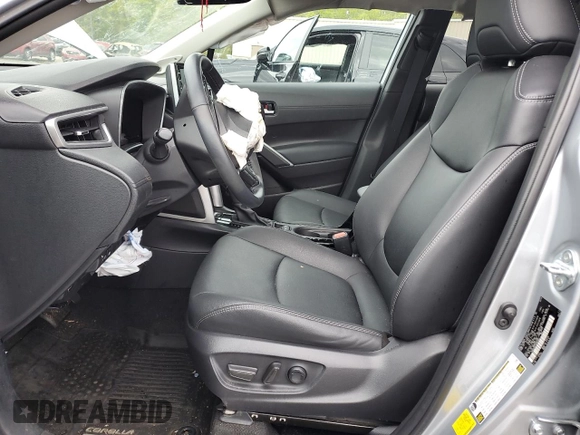 2022 Toyota Corolla Cross XLE with VIN 7MUDAABG2NV009663, listed as a Copart auction lot 55945735 with 59,473 mi miles and Salvage title. Bid and sale history available at DreamBid. Image 7.