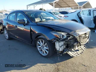 2014 Mazda 3 S Grand Touring with VIN JM1BM1W36E1112033, listed as a IAAI auction lot 41412655 with 115,050 mi miles and . Bid and sale history available at DreamBid. Image 1.