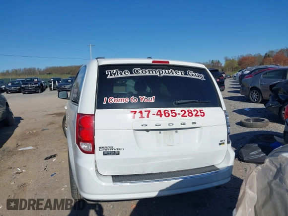 2019 Dodge Grand Caravan SXT with VIN 2C4RDGCG1KR545775, listed as a IAAI auction lot 42061287 with 131,603 mi miles and . Bid and sale history available at DreamBid. Image 16.
