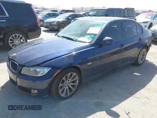 2011 BMW 3 Series 328i with VIN WBAPH7C55BE131127, listed as a IAAI auction lot 41860588 with 260,158 mi miles. Bid and sale history available at carsss.com. Image 2.