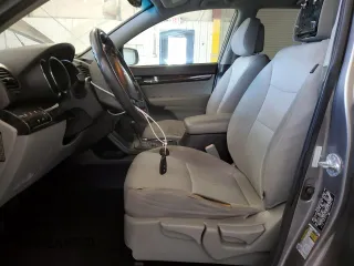 2012 Kia Sorento LX with VIN 5XYKT3A69CG205741, listed as a Copart auction lot 54657155 with 178,794 mi miles and Salvage Title. Bid and sale history available at DreamBid. Image 7.