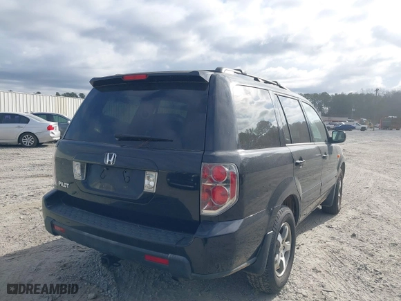2006 Honda Pilot EX-L with VIN 5FNYF28576B030507, listed as a IAAI auction lot 41720898 with 201,518 mi miles. Bid and sale history available at carsss.com. Image 4.