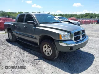 2005 Dodge Dakota SLT with VIN 1D7HE48N65S365506, listed as a IAAI auction lot 42588692 with 156,199 mi miles and . Bid and sale history available at DreamBid. Image 1.
