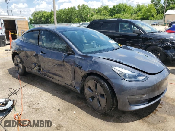2023 Tesla Model 3 with VIN 5YJ3E1EA4PF614129, listed as a Copart auction lot 62019385 with 23,218 mi miles and Salvage title. Bid and sale history available at DreamBid. Image 4.