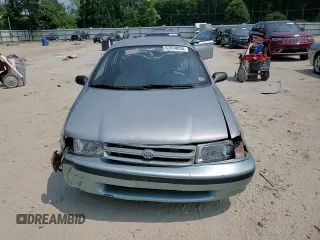 1994 Toyota Tercel DX z VIN JT2EL43T3R0489039, wystawiony jako Copart lot #67834034 z przebiegiem 139 726 mil mil oraz Szkoda całkowita • Salvage title. Historia ofert i sprzedaży dostępna na DreamBid. Obrazek 11.