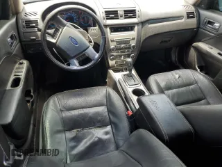2012 Ford Fusion SEL z VIN 3FAHP0JAXCR373157, wystawiony jako Copart lot #56920275 z przebiegiem 185 178 mil mil oraz Szkoda całkowita • Salvage title. Historia ofert i sprzedaży dostępna na DreamBid. Obrazek 8.