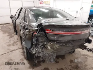 2015 Lincoln MKZ Hybrid z VIN 3LN6L2LU0FR624283, wystawiony jako IAAI lot #41402447 z przebiegiem 79 883 mil mil oraz . Historia ofert i sprzedaży dostępna na DreamBid. Obrazek 3.
