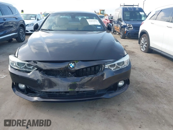 2014 BMW 4 Series 428i with VIN WBA3V5C50EP751257, listed as a IAAI auction lot 42431133 with 99,070 mi miles and . Bid and sale history available at DreamBid. Image 12.